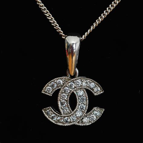 chanel logo diamond necklace|Chanel long necklace with logo.